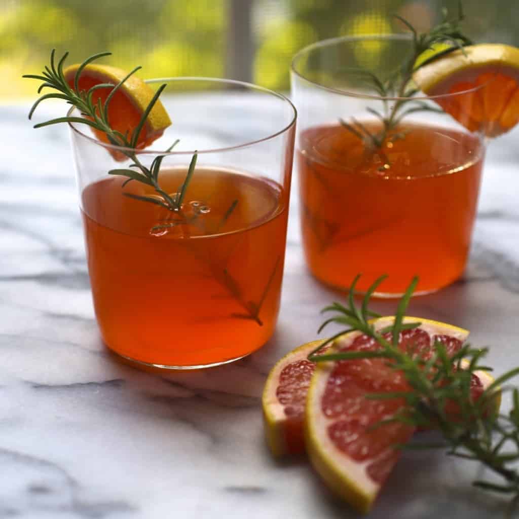Bourbon + Aperol Punch with Rosemary + Grapefruit
