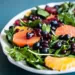 Baby Kale Salad with Oranges, Blueberries and Pomegranate | HelloGlow.co