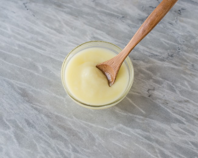 Treat your locks to this luxurious DIY deep hair conditioner with coconut oil, shea butter, argan oil and a variety of nourishing essential oils | HelloGlow.co