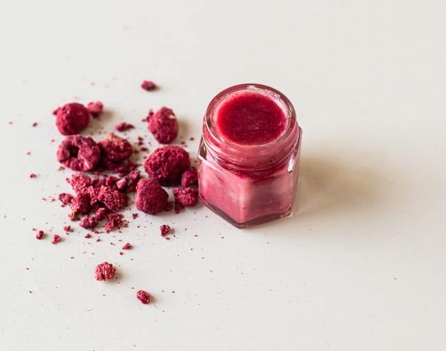 All-Natural DIY Tinted Lip Balm with Raspberries | HelloGlow.co