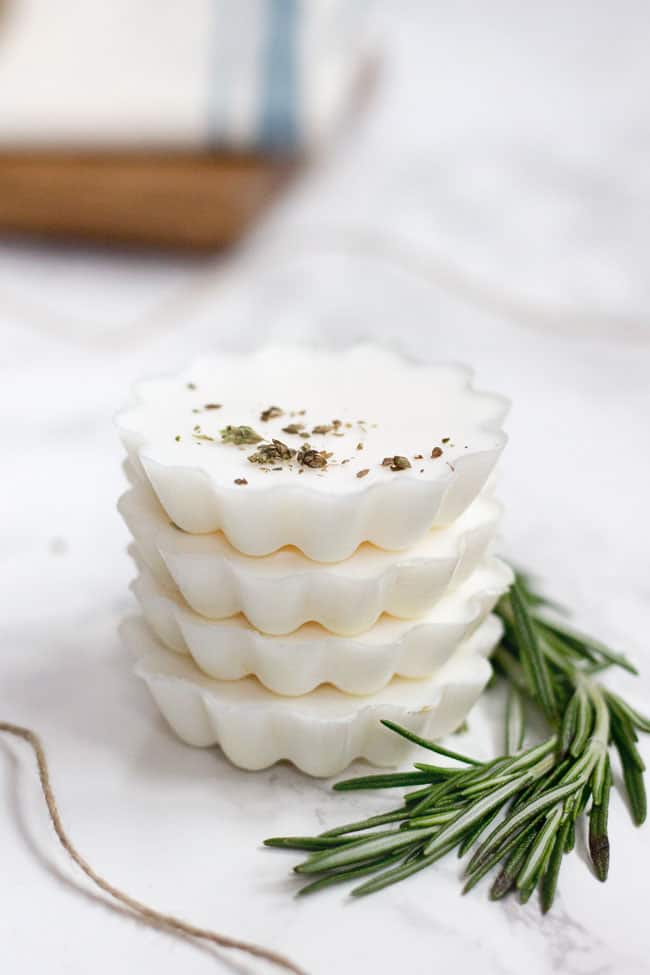 These easy essential oil soaps are made with pure essential oils and a moisturizing shea butter base - perfect for holiday gift giving!