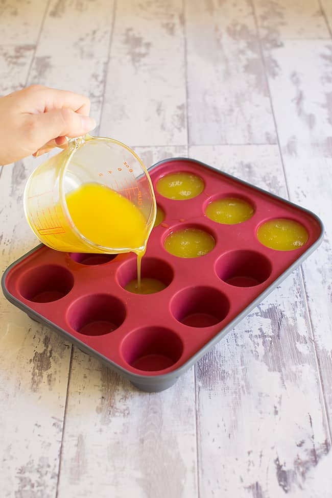 pouring jelly soap mix into molds