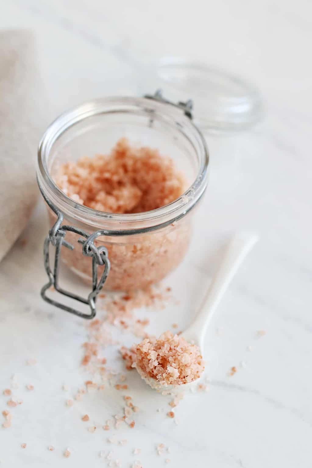 This detoxifying apple cider vinegar scrub uses finely ground pink Himalayan salt to slough away dead skin and deep clean hair follicles.