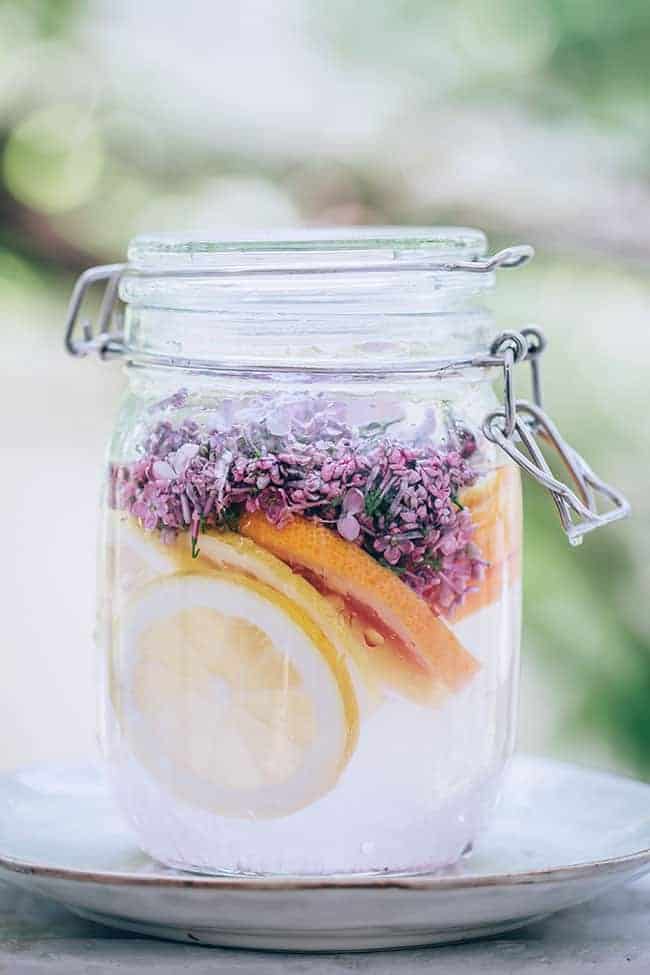 Let homemade cordial with lilac sit for 48 hours in a sunny spot