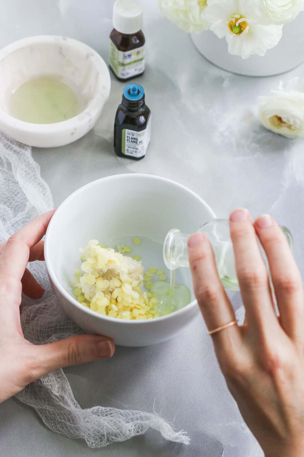 Melt cocoa butter and oils together for a soothing after sun balm