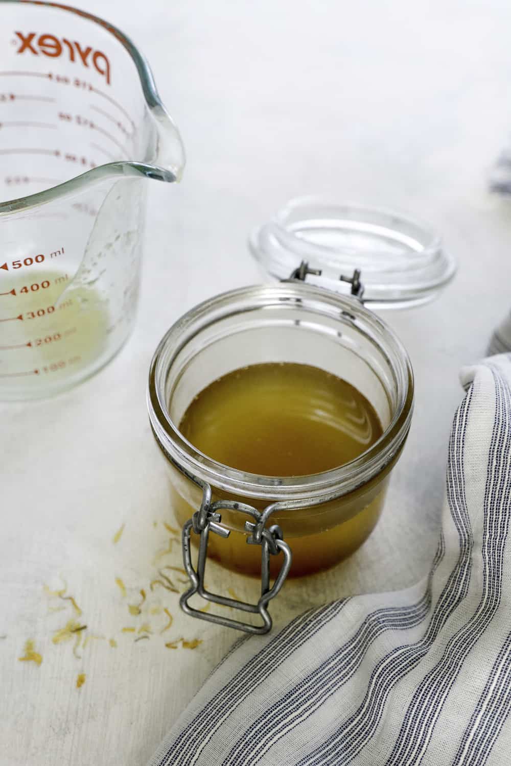 Pour balm into glass jar