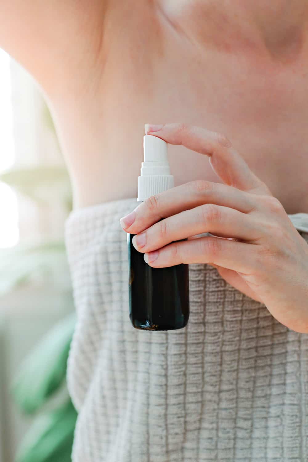 Using natural deodorant spray