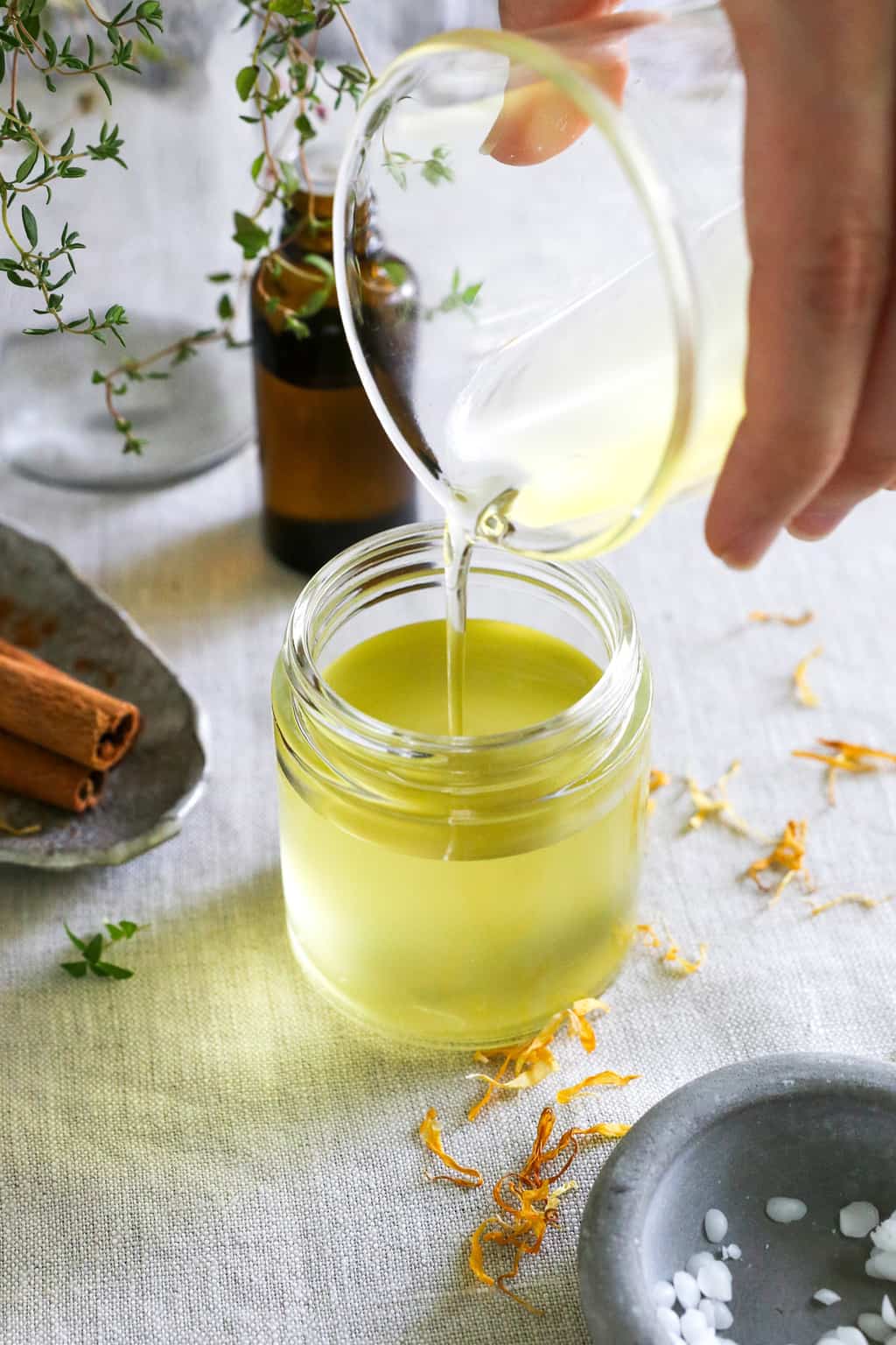 Pour muscle balm mixture into jar and let cool