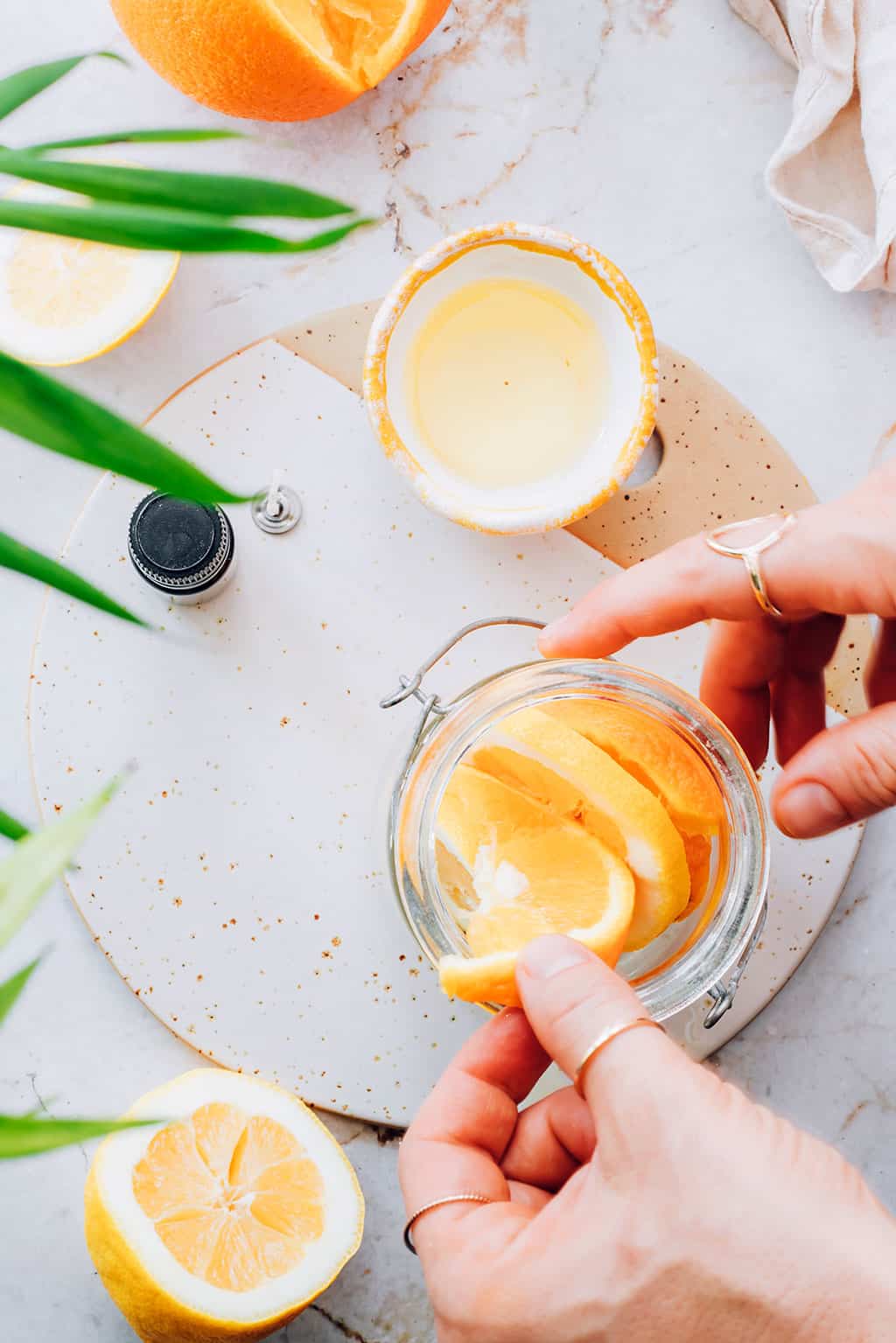 Add fruit or flowers to make easy mason jar candles