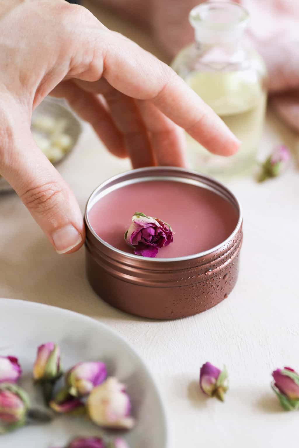 This DIY 5-ingredient rose salve is perfect for taming flyaways, healing chapped lips, soothing irritation and making skin glow.