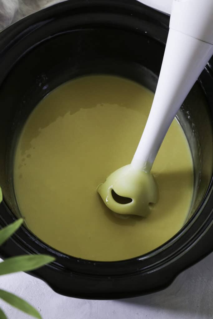 Mixing ingredients together for making olive oil soap