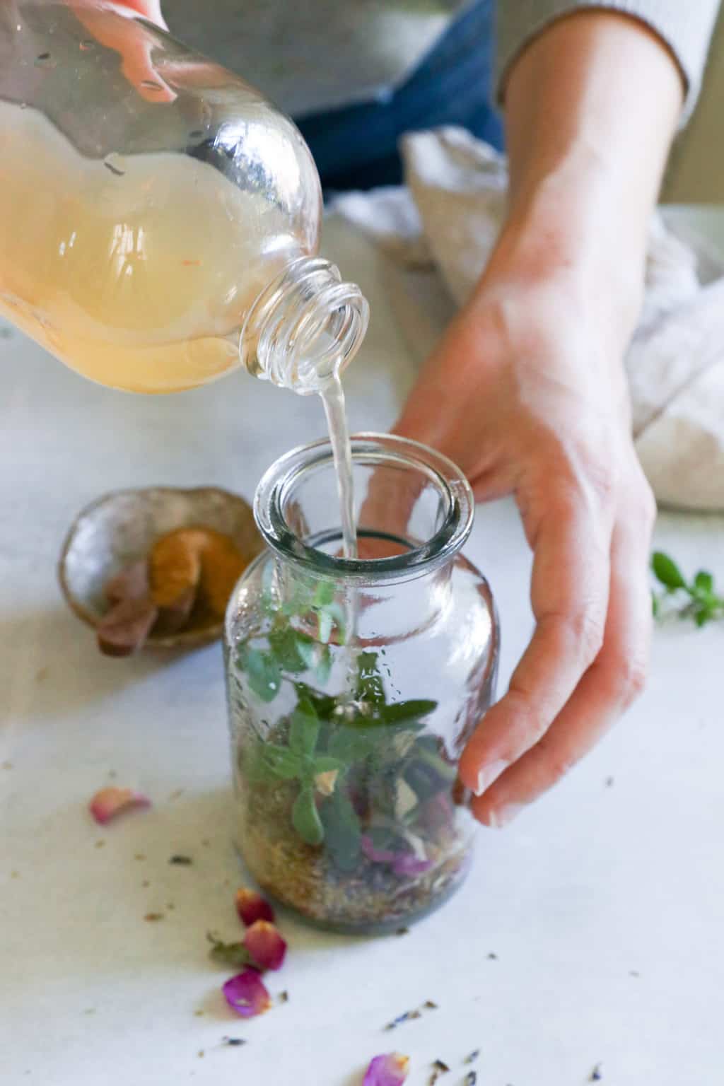 Add vinegar to infuse with herbs