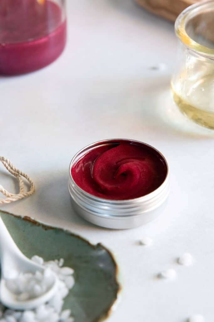 This easy DIY Lip Gloss gives your lips a sheer red wine hue. Made with jojoba and castor oil, this lip gloss will moisturize and give plenty of shine.
