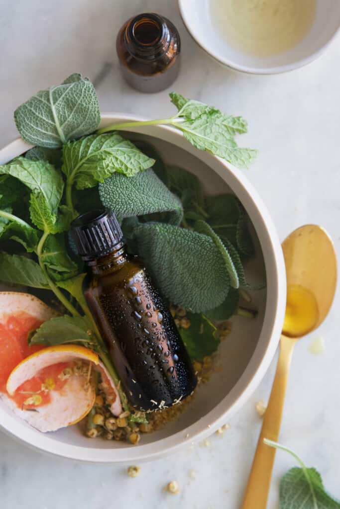Guess what? It's actually easy to make essential oils at home with nothing more than fresh plants, some water and slow cooker. Here's how.