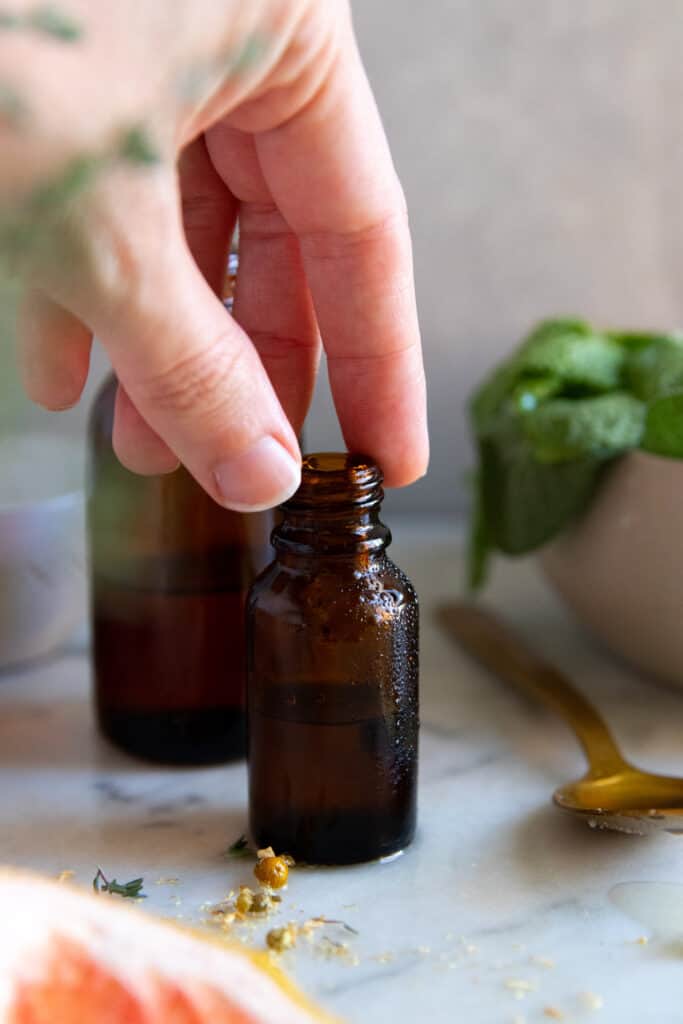 Guess what? It's actually easy to make essential oils at home with nothing more than fresh plants, some water and slow cooker. Here's how.