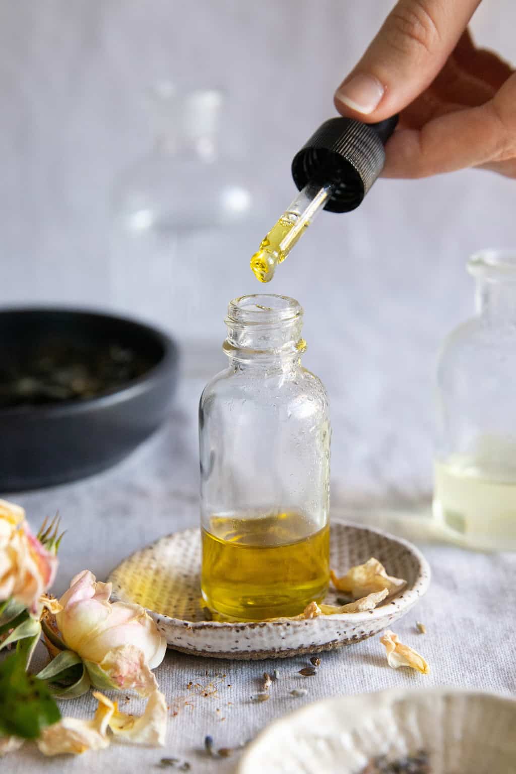 Adding essential oils for scars to a homemade face serum recipe