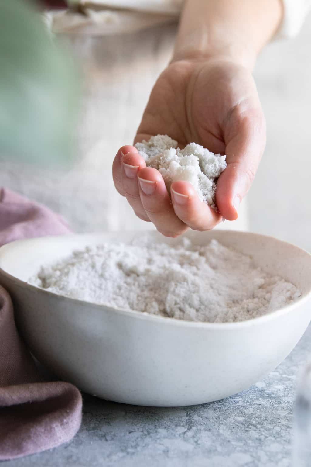 Making bath bombs? Your mixture should be the texture of clumpy sand