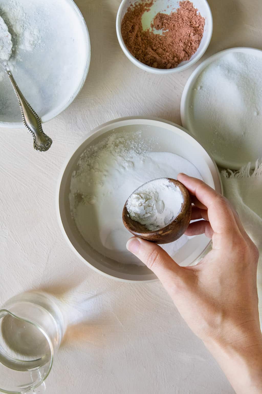 Combine baking soda, citric acid and corn starch to make your own shower bombs