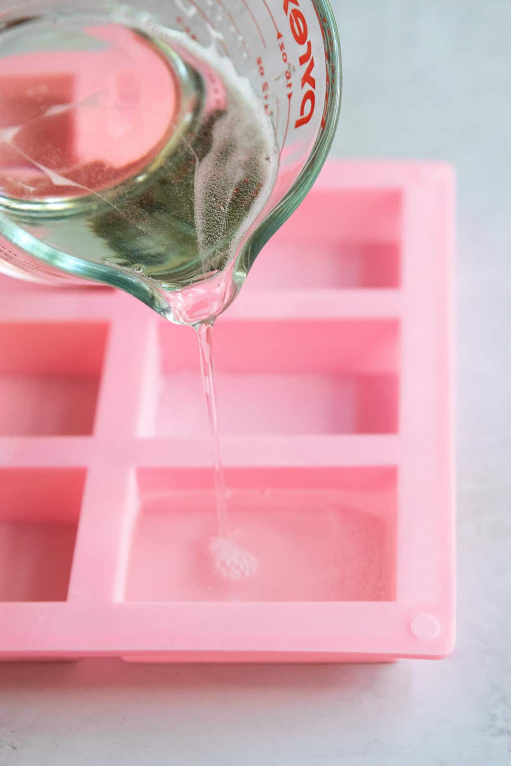 Pour glycerin soap into soap molds