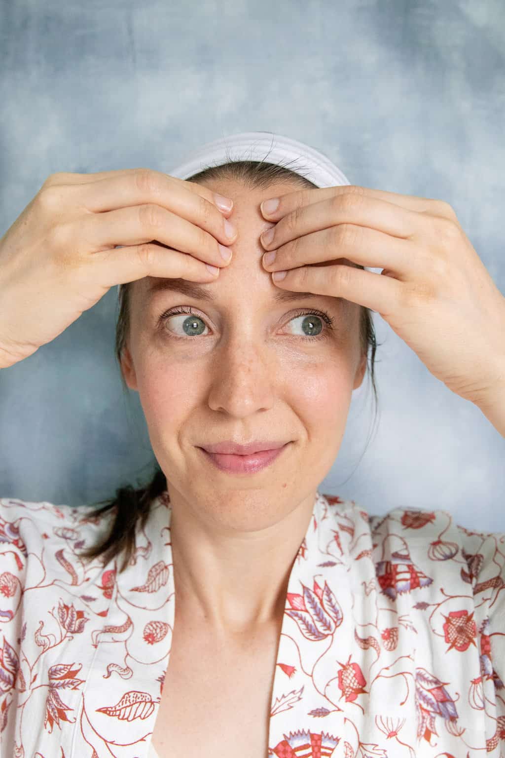 Face yoga exercise for forehead lines