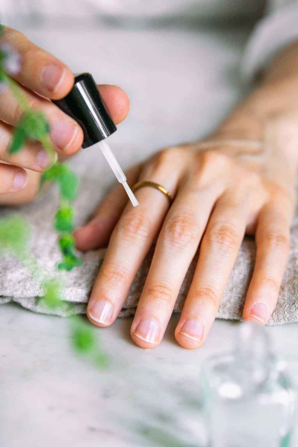 Apply a base coat - step 5 in how to do a french manicure at home 
