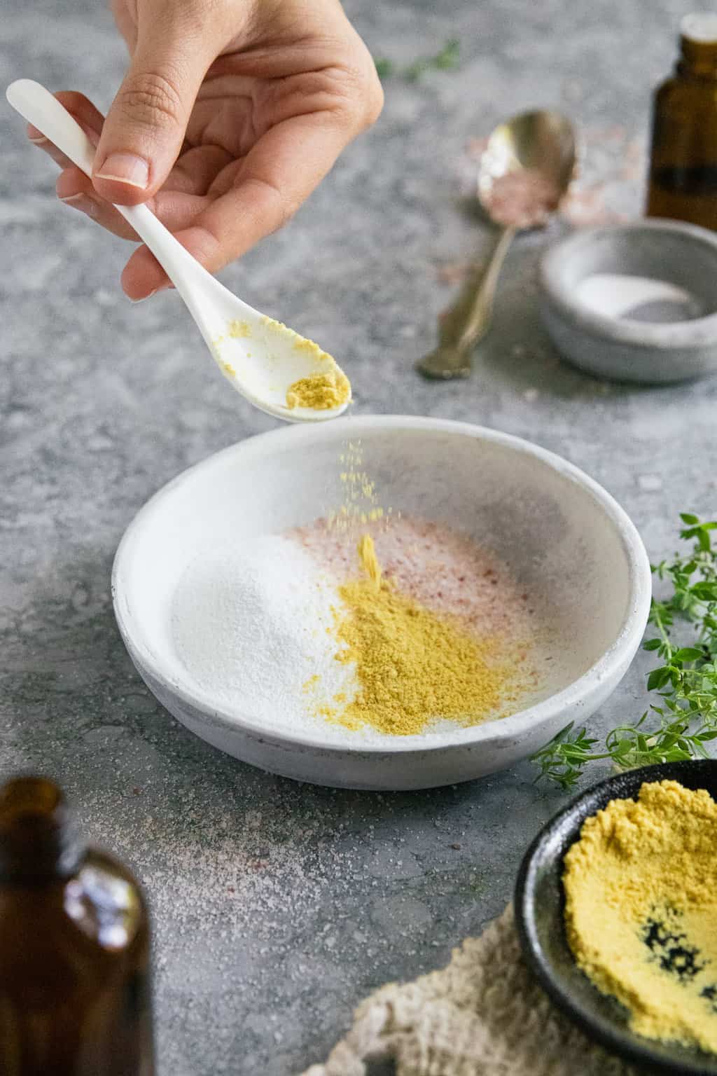 Combining ingredients for a homemade mustard bath