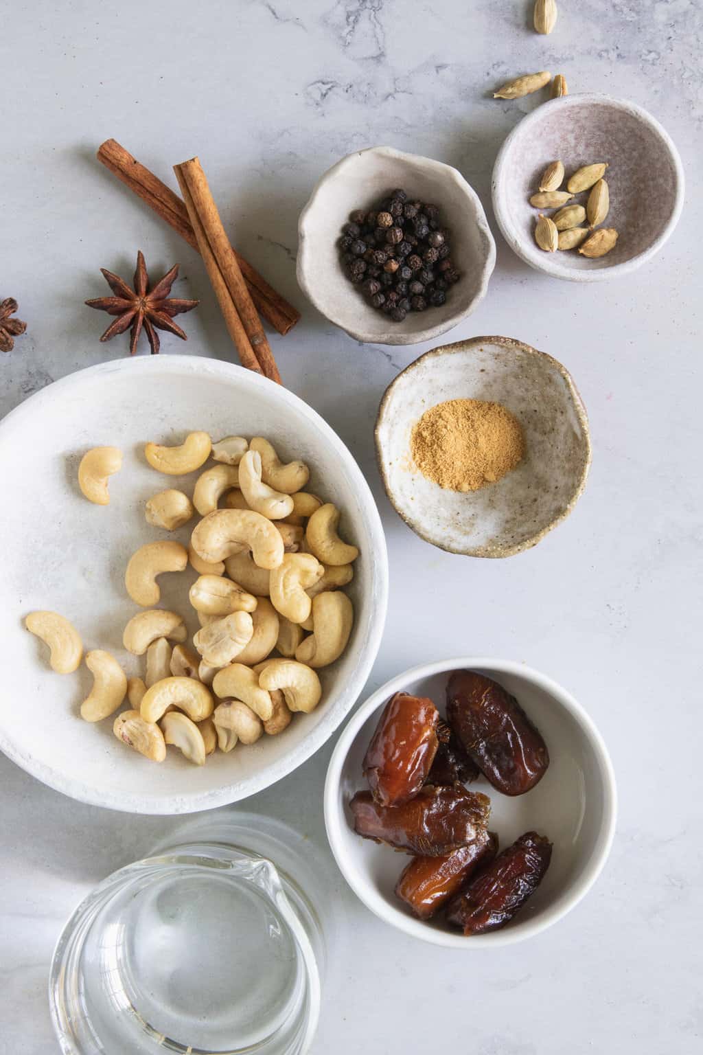 Ingredients for homemade cashew milk with chai spices