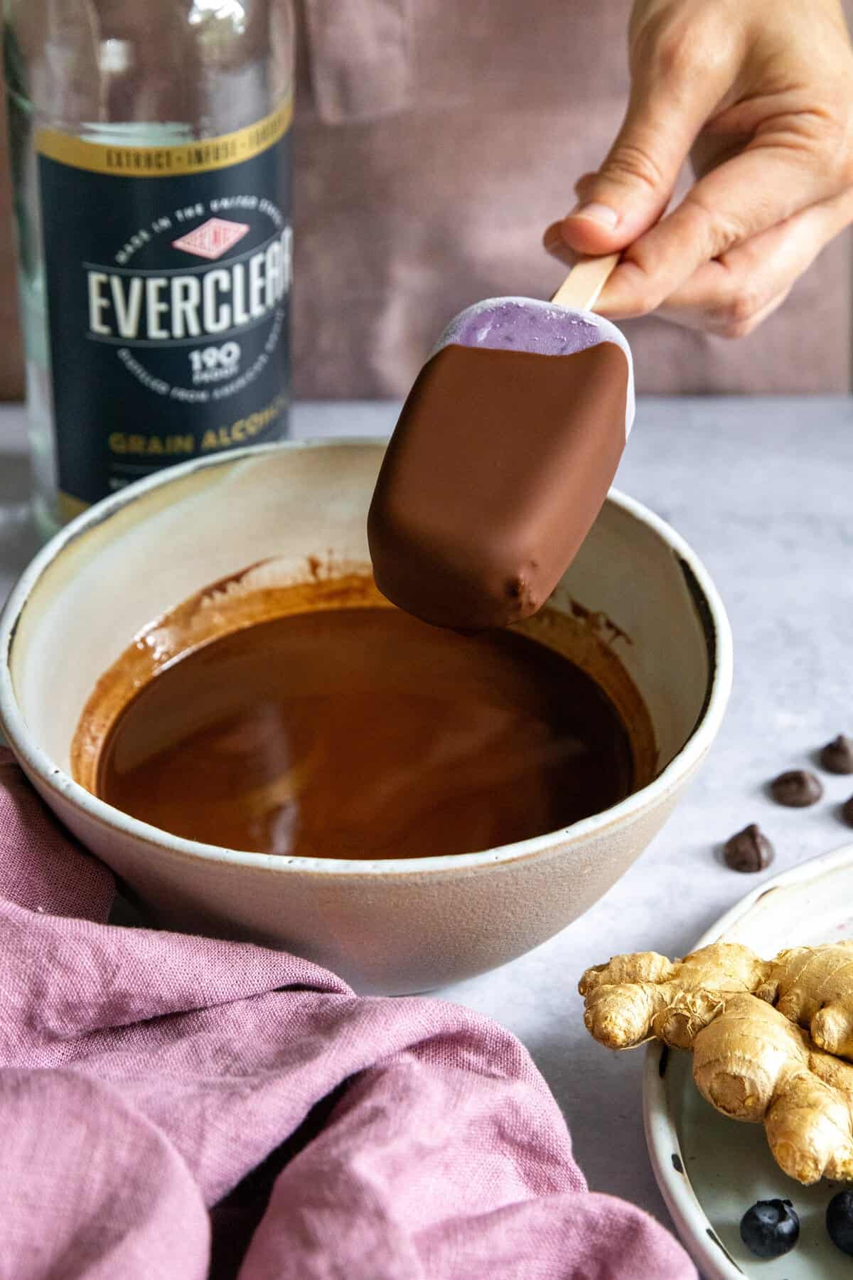 Dipping popsicles in chocolate
