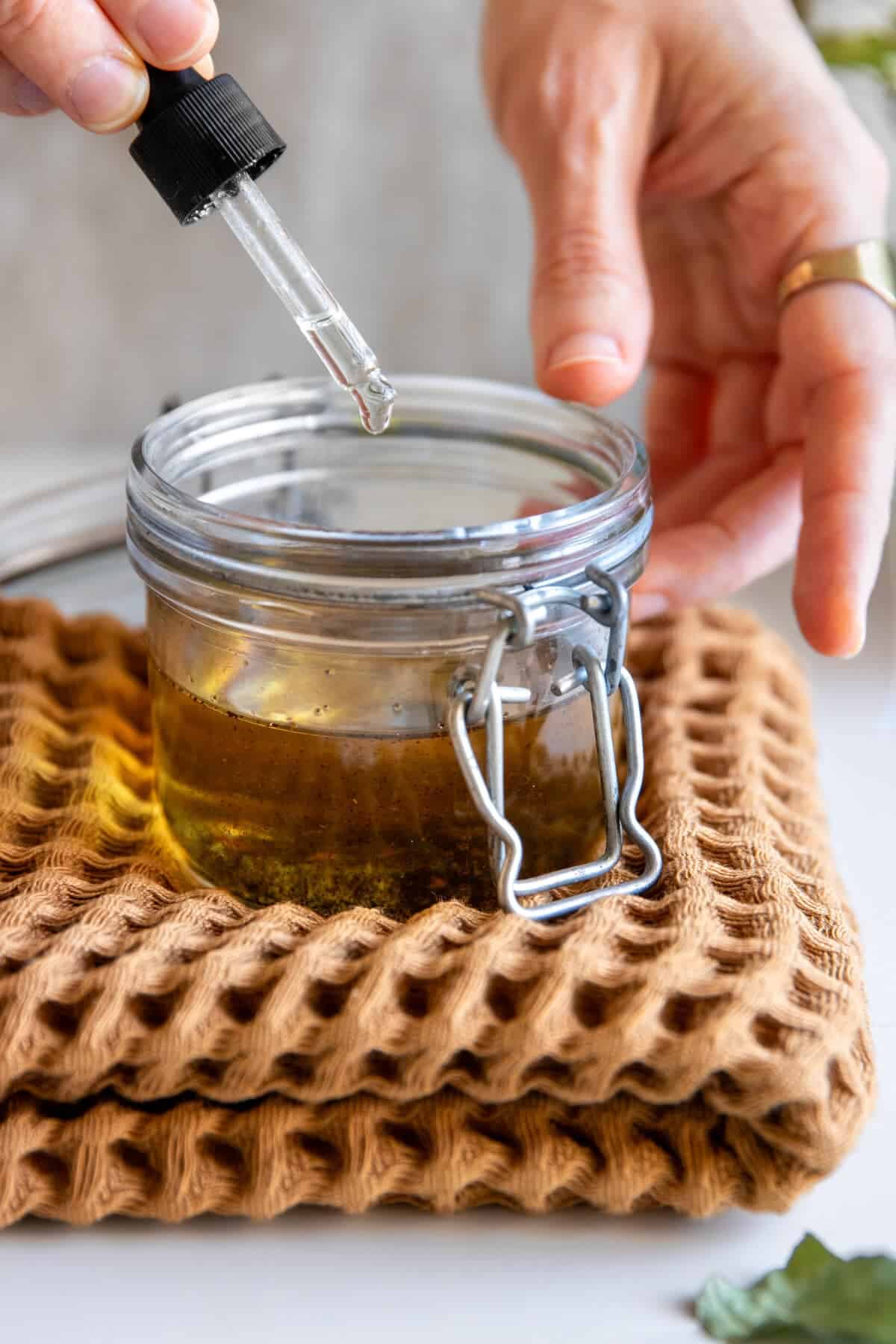 Add essential oils to DIY vanilla perfume