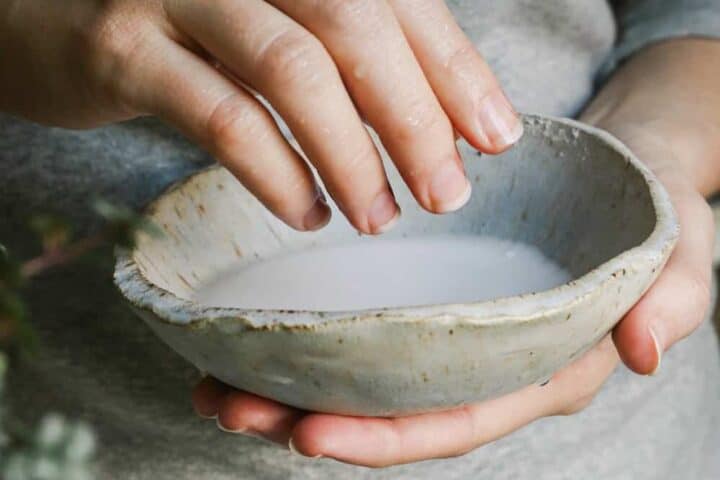 Soak nails to soften cuticles in at home manicure