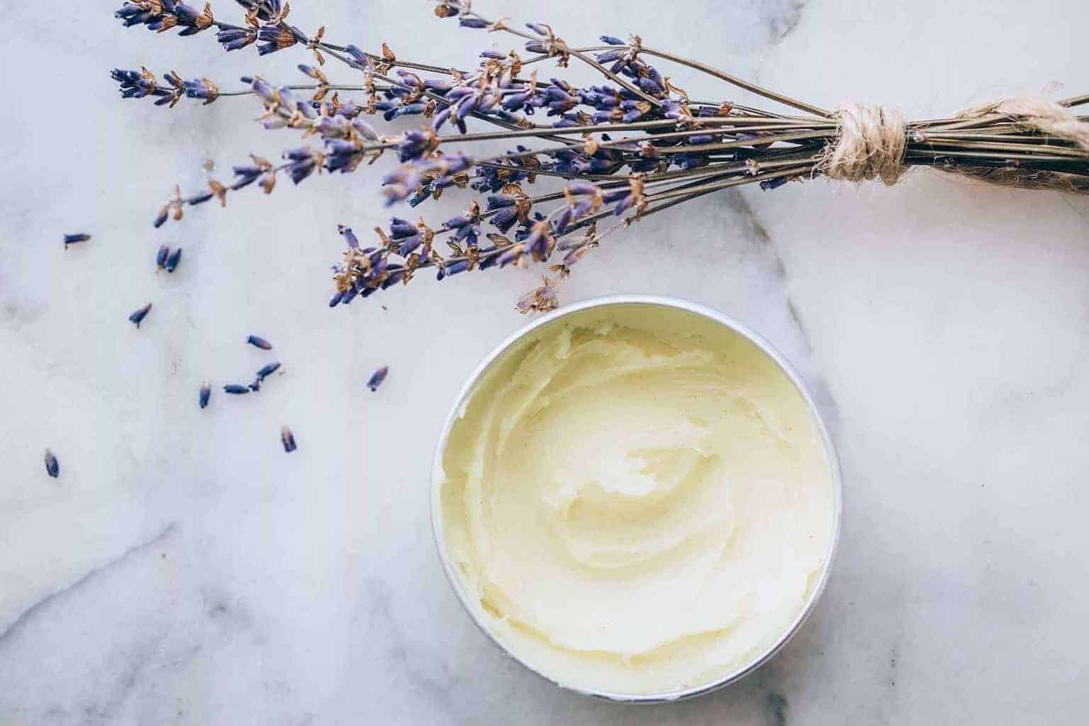 Use this DIY Neosporin salve recipe infused with lavender and calendula on those scrapes or cuts that are sure to walk in the door this summer.