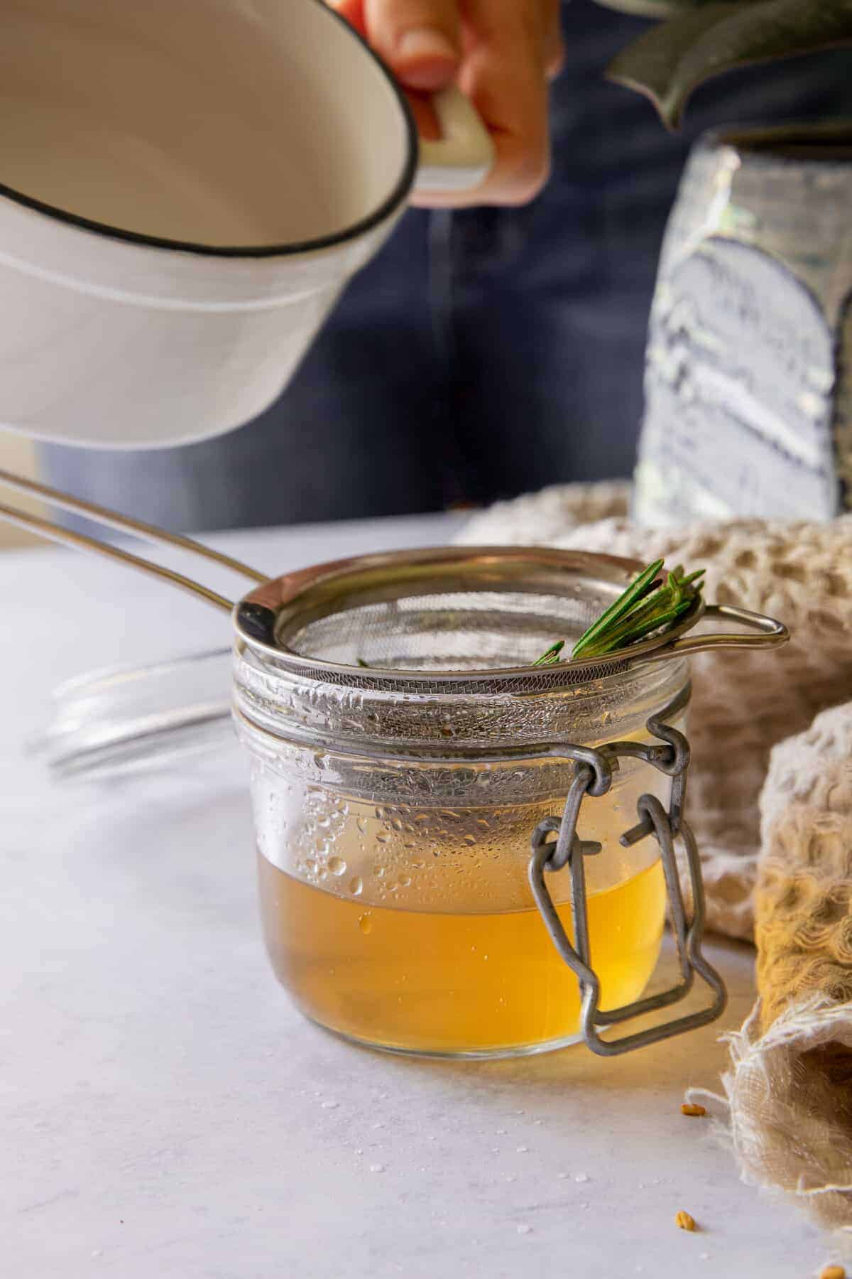 Strain Out Herbs for homemade scalp serum recipe