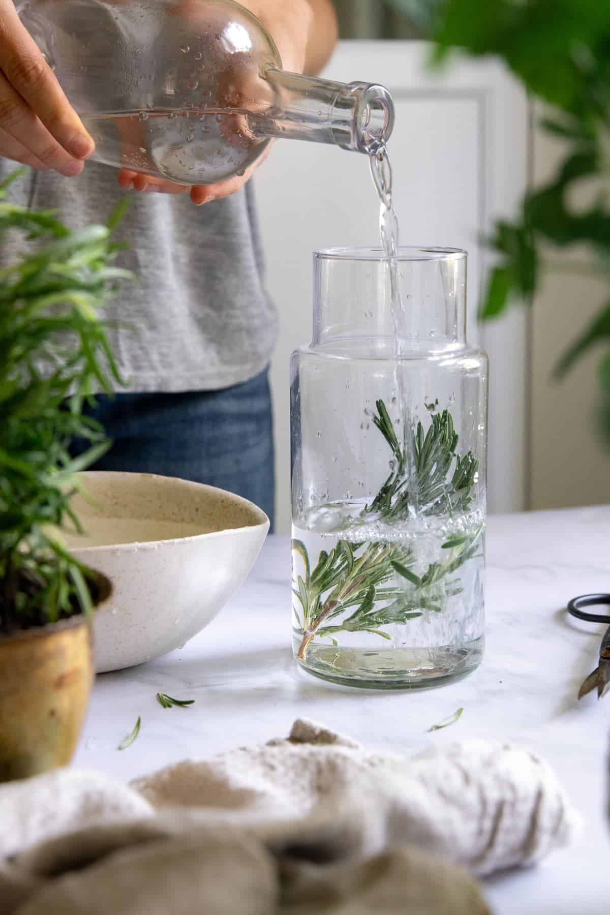 Infuse rosemary in alcohol