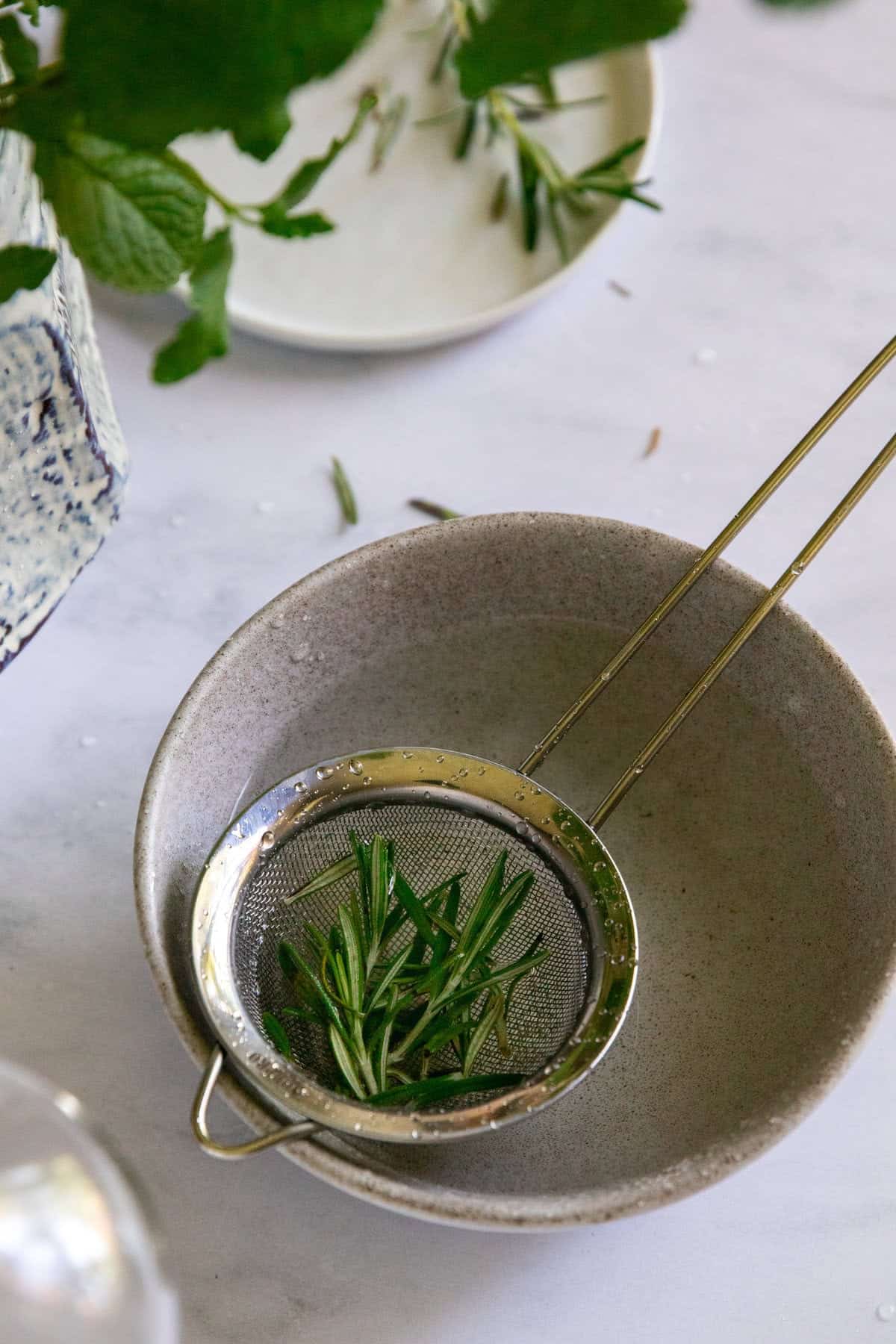 Strain out the infused rosemary