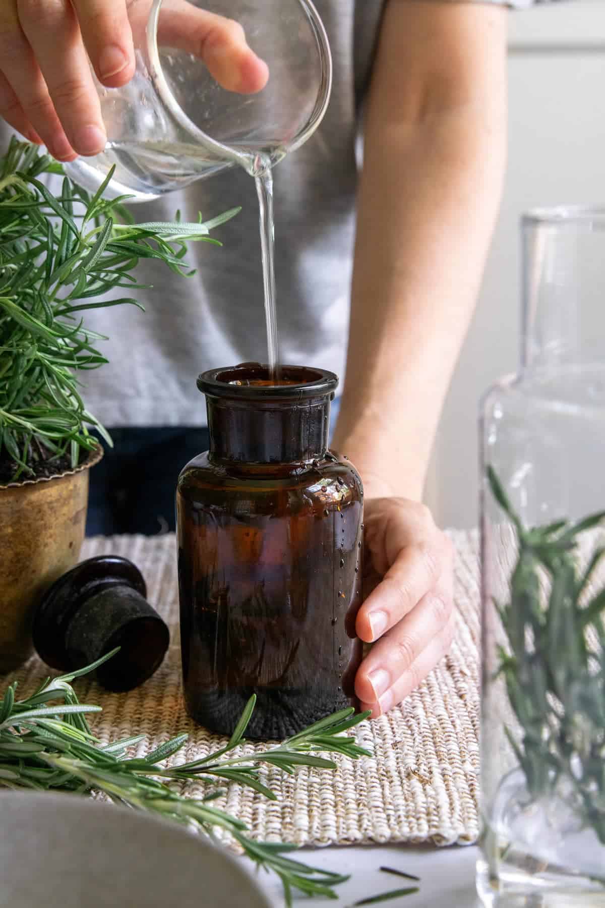 Transfer homemade Hungary Water to Dark Glass Bottle