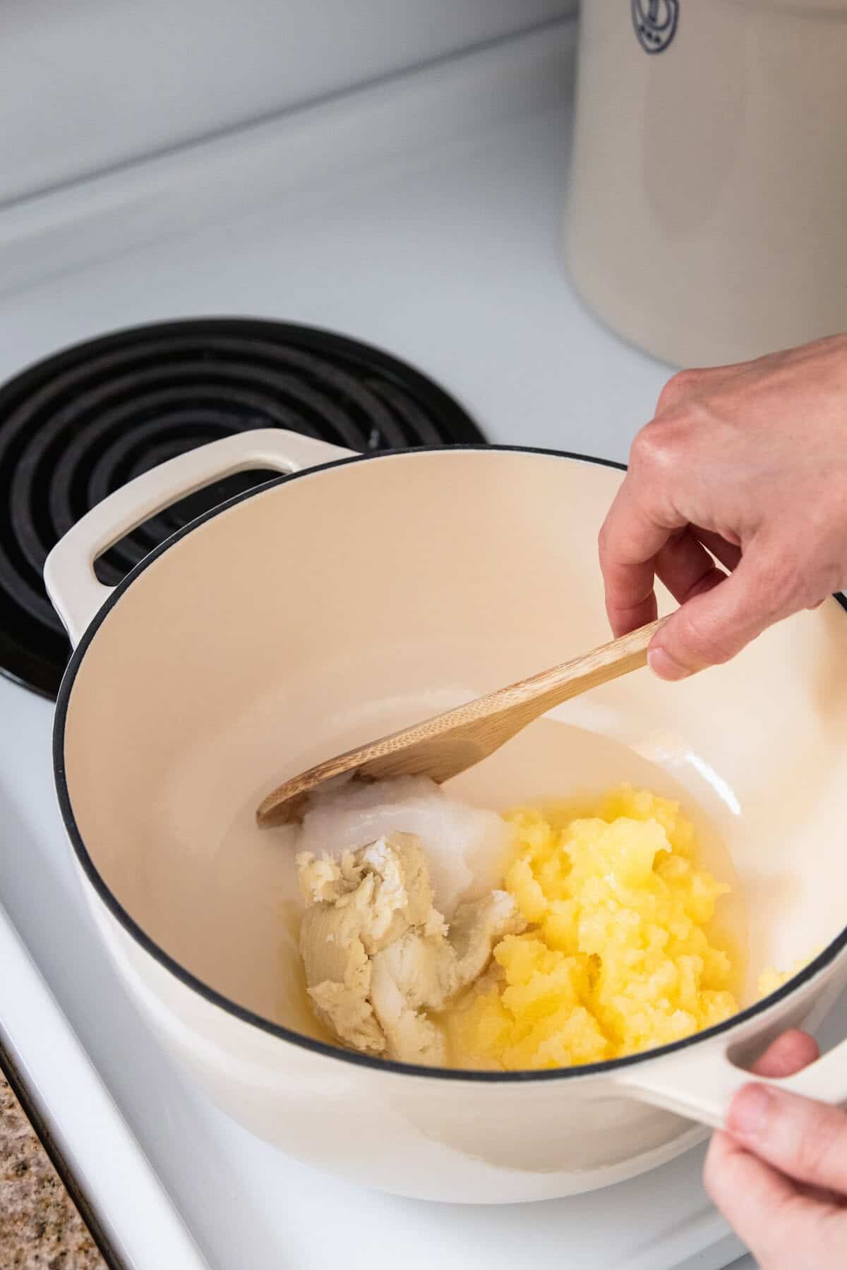 melting tallow and shea butter for soap recipe with goat milk