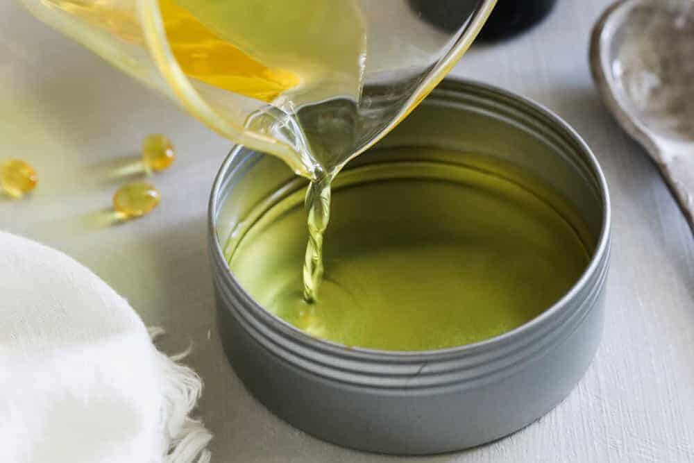 Pour eye cream into small tins
