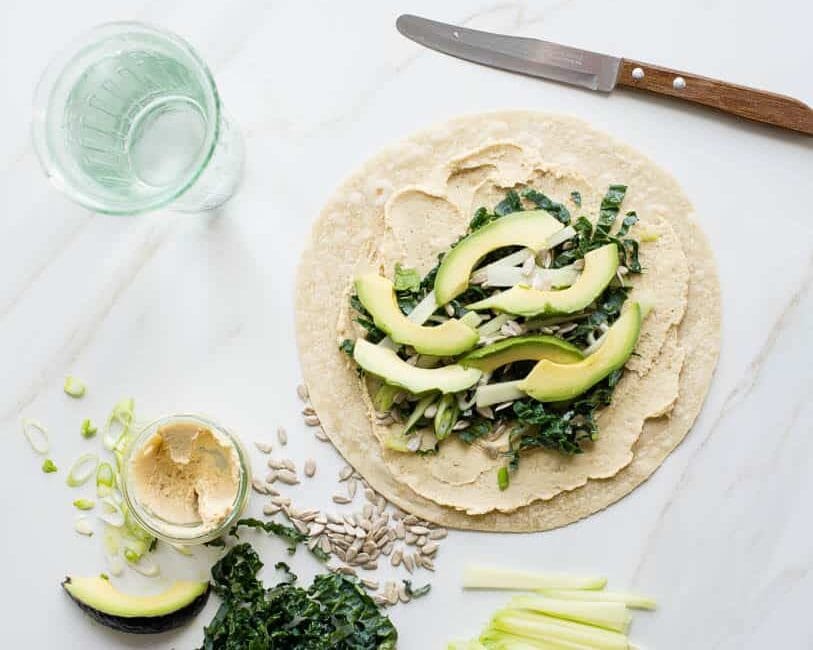 Protein Packed Kale, Avocado + Hummus Wrap | HelloGlow.co
